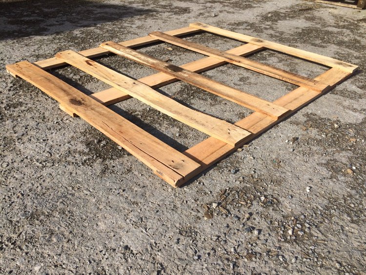 Part-boarded reconditioned pallet top